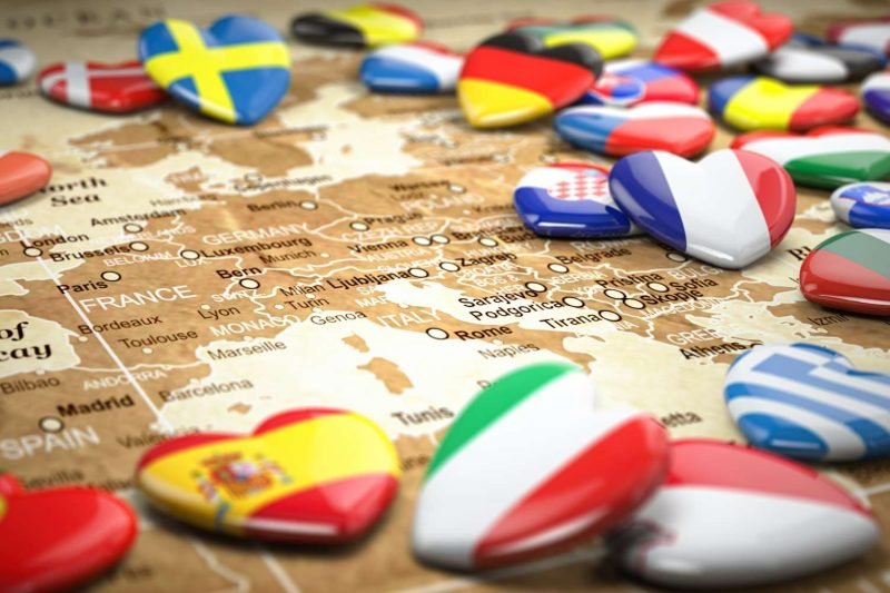 Map of Europe and hearts with flags of european countries